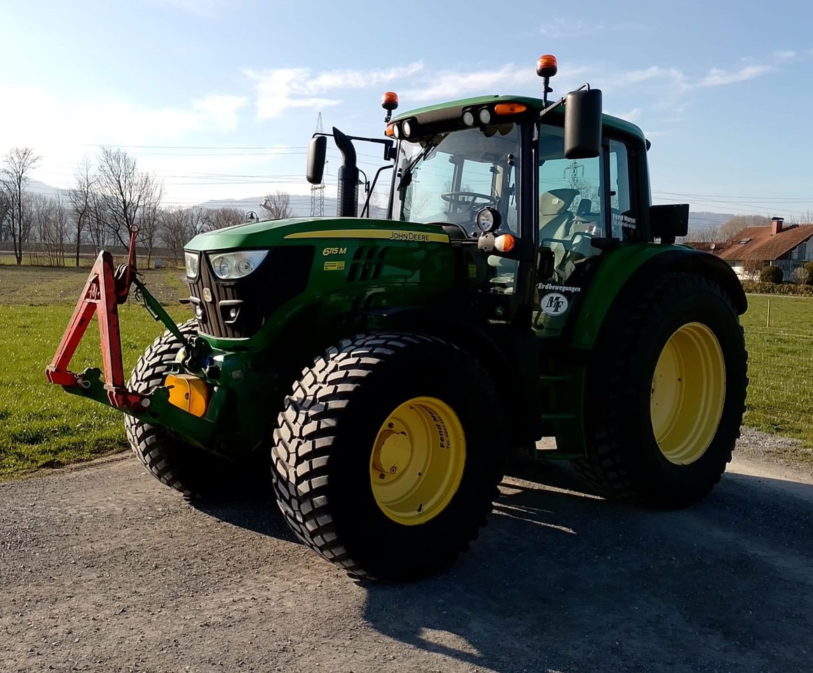 John Deere 6115M, EU Papiere - Traktors: foto 1 John Deere 6115M, EU Papiere - Traktors: foto 1