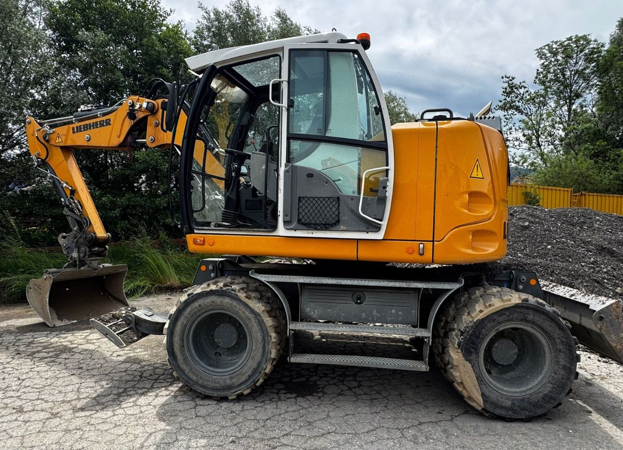 Liebherr A910 Compact Litronic,3 Schaufeln,Schnellwechsle - Riteņu ekskavators: foto 1 Liebherr A910 Compact Litronic,3 Schaufeln,Schnellwechsle - Riteņu ekskavators: foto 1