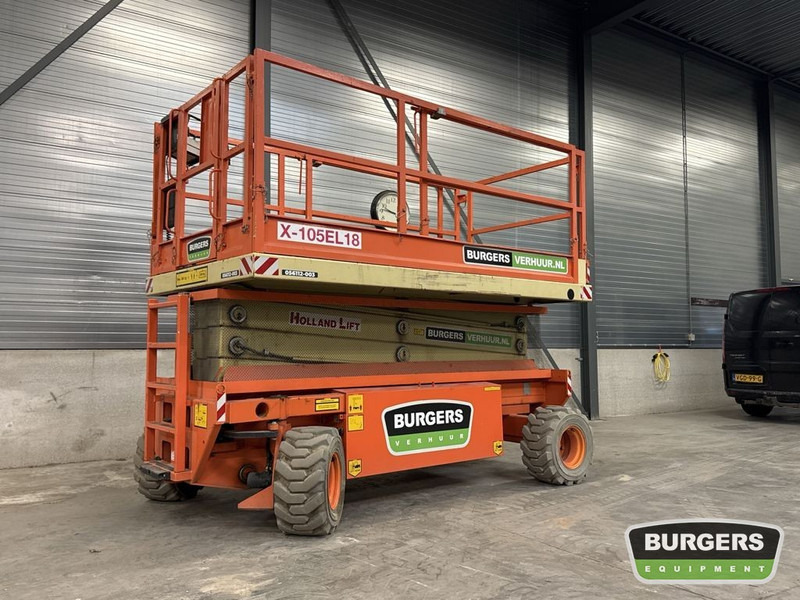 HOLLANDLIFT X-105 EL18 - Šķērveida pacēlājs: foto 1 HOLLANDLIFT X-105 EL18 - Šķērveida pacēlājs: foto 1