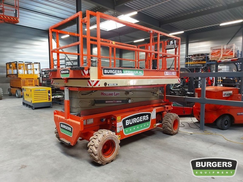 HOLLANDLIFT X-105EL18 - Šķērveida pacēlājs: foto 1 HOLLANDLIFT X-105EL18 - Šķērveida pacēlājs: foto 1