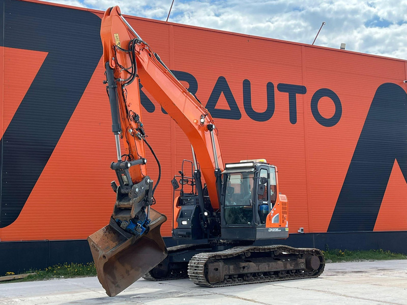 Doosan DX 235 LCR-5 3 D / ROTOTILT / CENTRAL LUBRICATION / AC - Kāpurķēžu ekskavators: foto 1 Doosan DX 235 LCR-5 3 D / ROTOTILT / CENTRAL LUBRICATION / AC - Kāpurķēžu ekskavators: foto 1