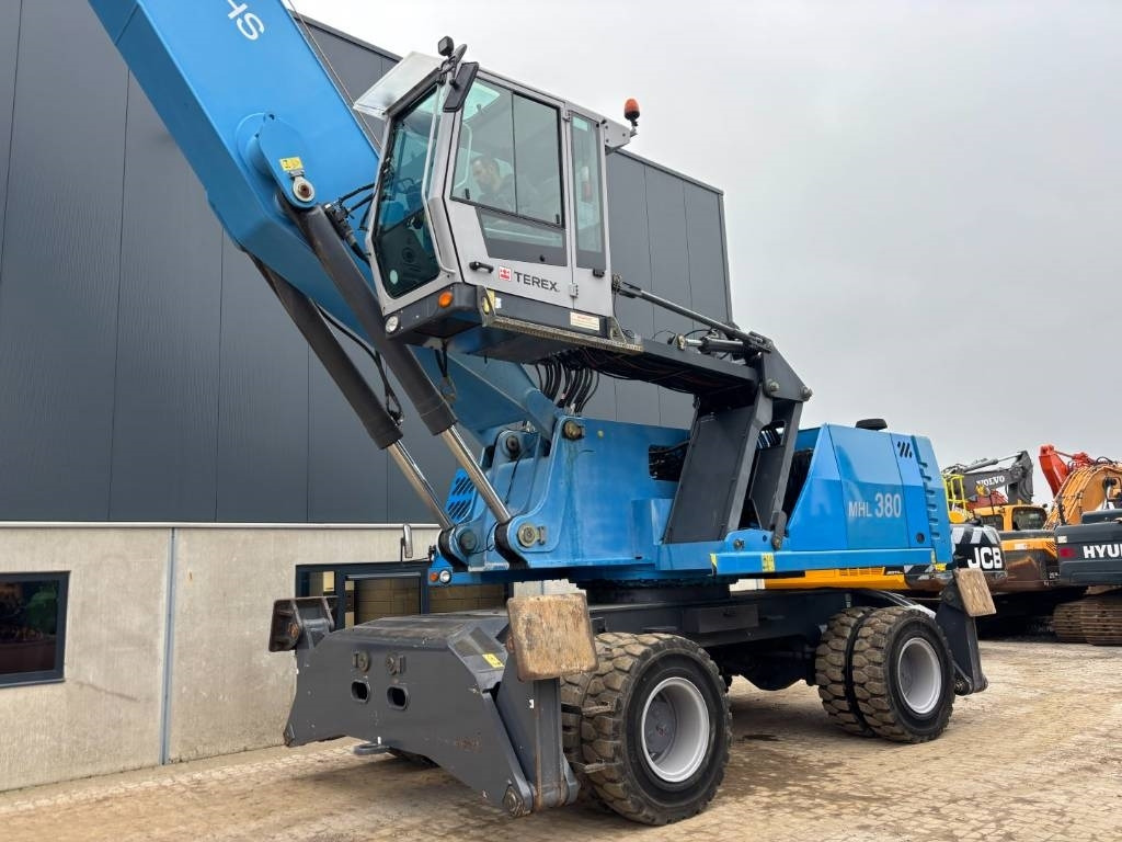 Atkritumu iekrāvējs Fuchs MHL 380 -- only 6650 real working hours: foto 7