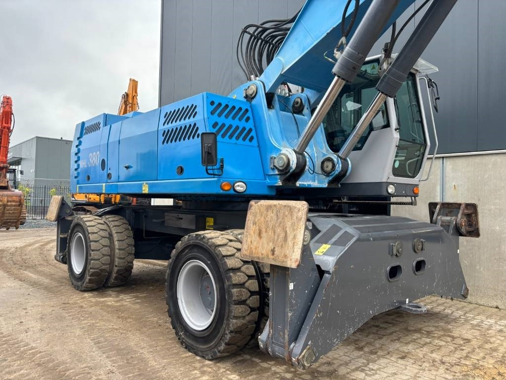 Atkritumu iekrāvējs Fuchs MHL 380 -- only 6650 real working hours: foto 31