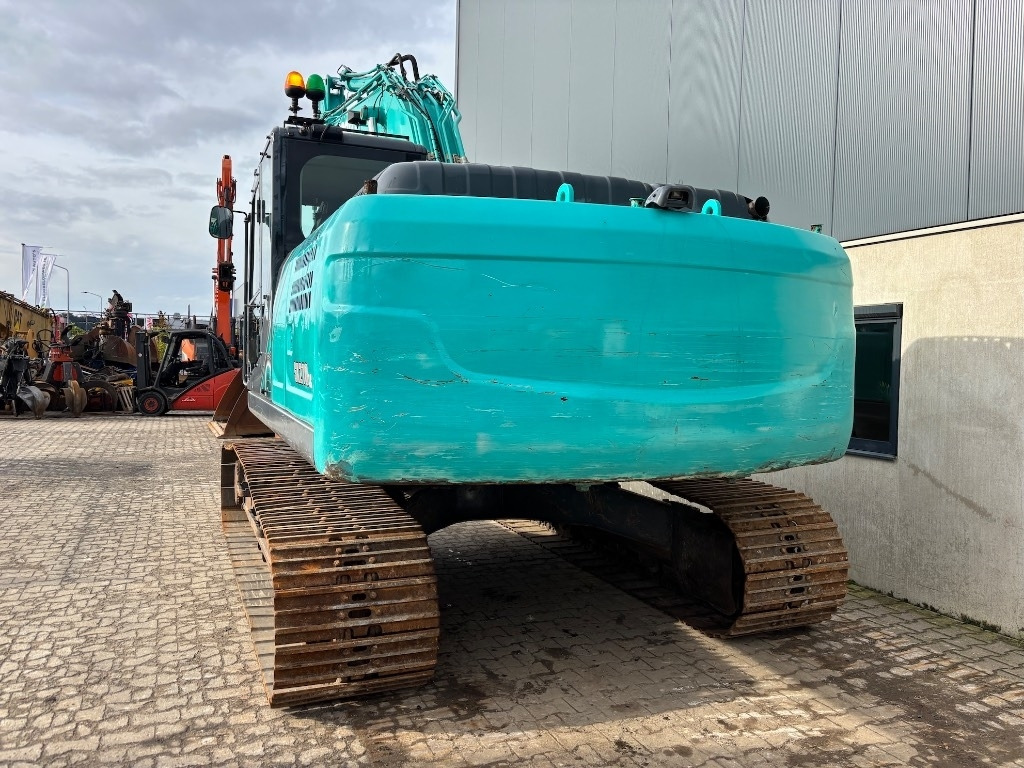 Kobelco SK 210 LC-10 - SK210 - SK 210 - Kāpurķēžu ekskavators: foto 4 Kobelco SK 210 LC-10 - SK210 - SK 210 - Kāpurķēžu ekskavators: foto 4
