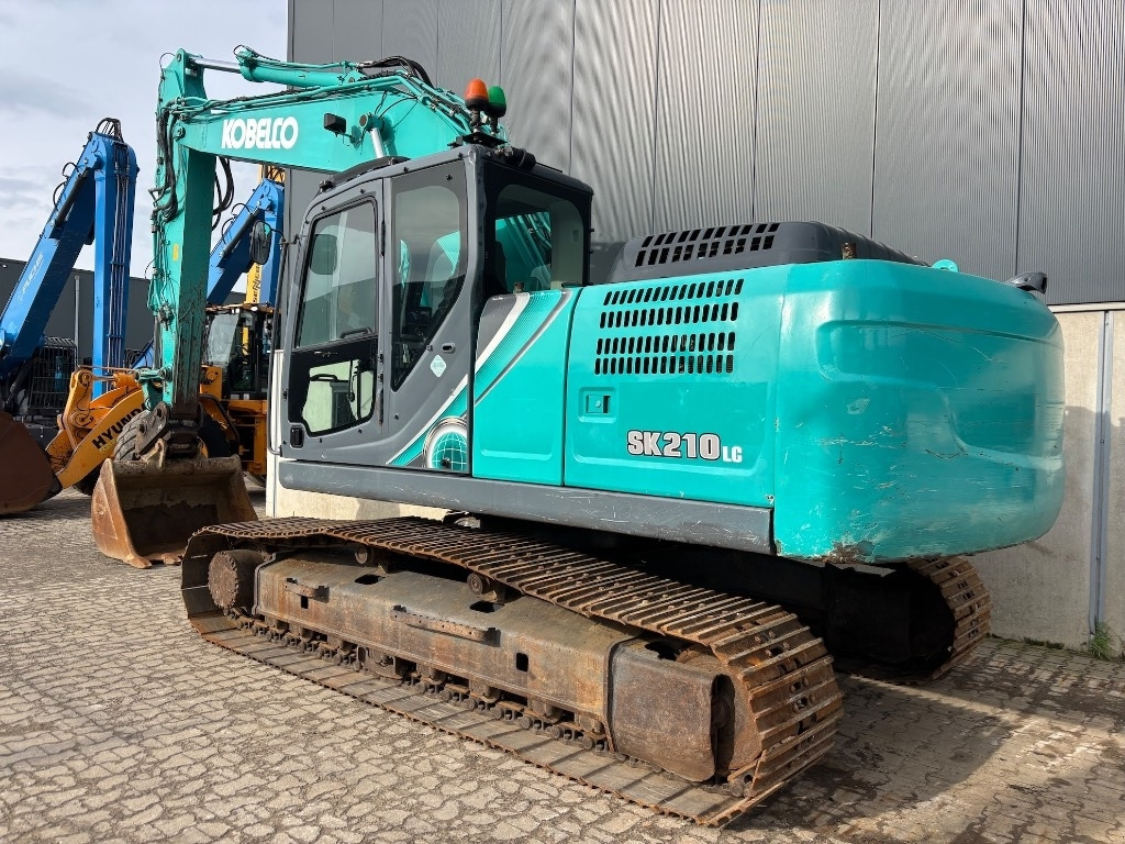Kobelco SK 210 LC-10 - SK210 - SK 210 - Kāpurķēžu ekskavators: foto 3 Kobelco SK 210 LC-10 - SK210 - SK 210 - Kāpurķēžu ekskavators: foto 3