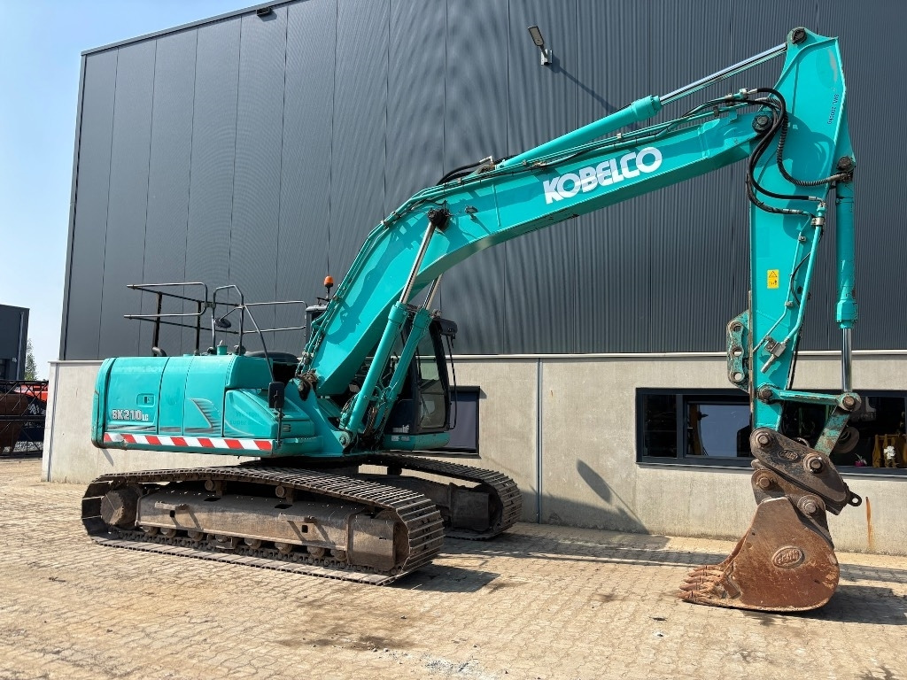 Kobelco SK 210 LC-9 - SK210 - SK 210 - Kāpurķēžu ekskavators: foto 5 Kobelco SK 210 LC-9 - SK210 - SK 210 - Kāpurķēžu ekskavators: foto 5