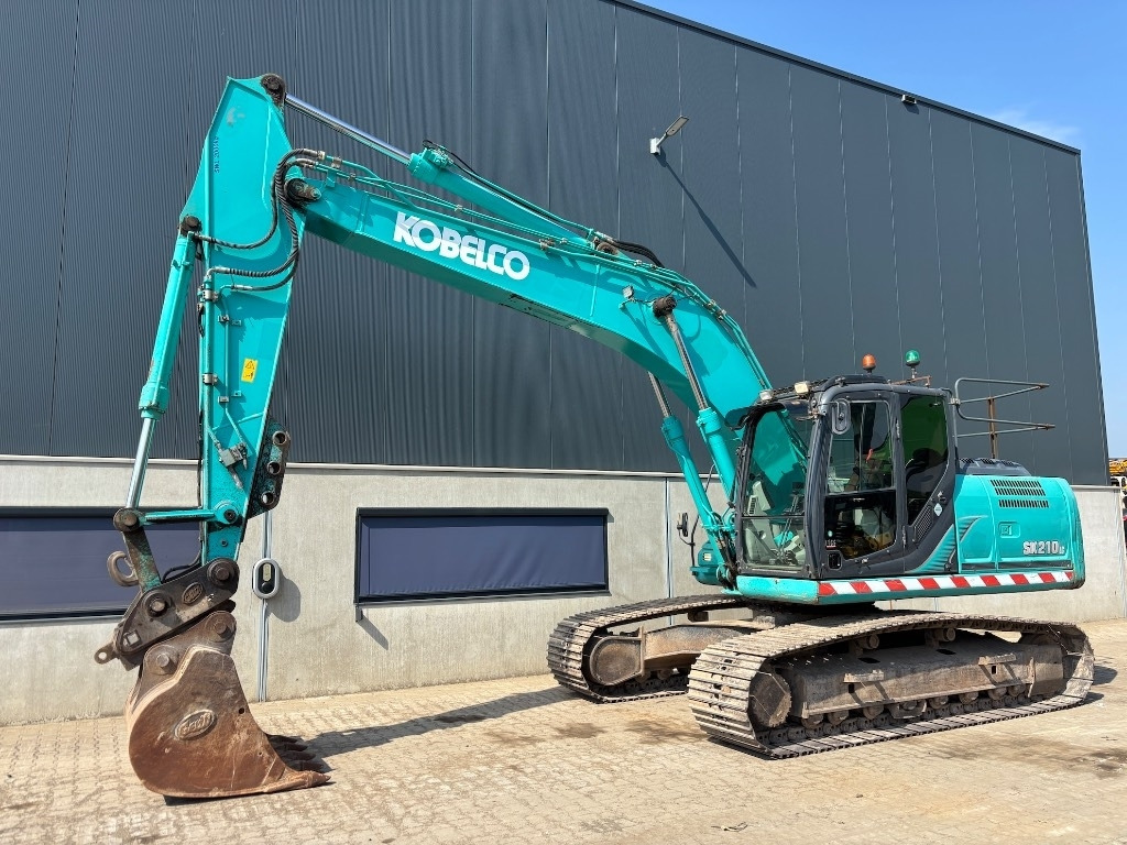Kobelco SK 210 LC-9 - SK210 - SK 210 - Kāpurķēžu ekskavators: foto 1 Kobelco SK 210 LC-9 - SK210 - SK 210 - Kāpurķēžu ekskavators: foto 1