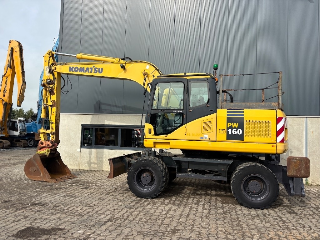 Komatsu PW 160-7 - PW160 - PW 160 - PW 180 - PW 140 - Riteņu ekskavators: foto 3 Komatsu PW 160-7 - PW160 - PW 160 - PW 180 - PW 140 - Riteņu ekskavators: foto 3