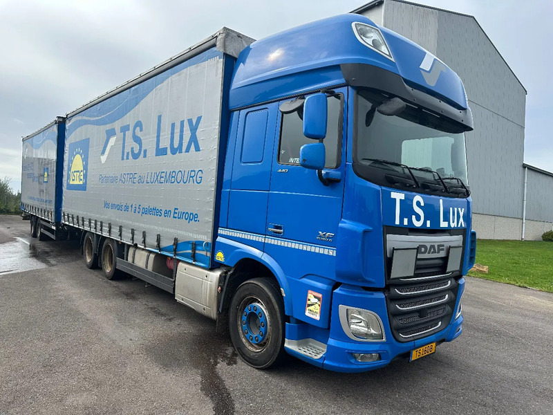DAF XF 440 6x2 / SUPERSPACECAB / KOMBI MIT ANHANGER SCHMITZ 2016 / DURCHLADEN / 2 STUCK - Kravas automašīna ar tentu: foto 2 DAF XF 440 6x2 / SUPERSPACECAB / KOMBI MIT ANHANGER SCHMITZ 2016 / DURCHLADEN / 2 STUCK - Kravas automašīna ar tentu: foto 2