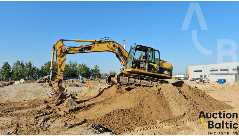 Caterpillar 315 C - Kāpurķēžu ekskavators: foto 1 Caterpillar 315 C - Kāpurķēžu ekskavators: foto 1