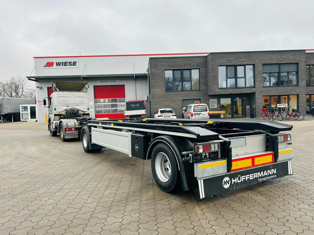 Hüffermann HAR 20.70 LS Aussenrollen Anhänger Sofort Verfüg - Multilift/ Būvgružu konteinera piekabe: foto 1 Hüffermann HAR 20.70 LS Aussenrollen Anhänger Sofort Verfüg - Multilift/ Būvgružu konteinera piekabe: foto 1