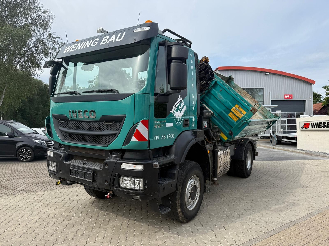 Iveco AD190 T/W Trakker 410 4x4 Allrad Kran KipperHIAB - Kravas automašīna pašizgāzējs, Kravas auto ar manipulatoru: foto 1 Iveco AD190 T/W Trakker 410 4x4 Allrad Kran KipperHIAB - Kravas automašīna pašizgāzējs, Kravas auto ar manipulatoru: foto 1