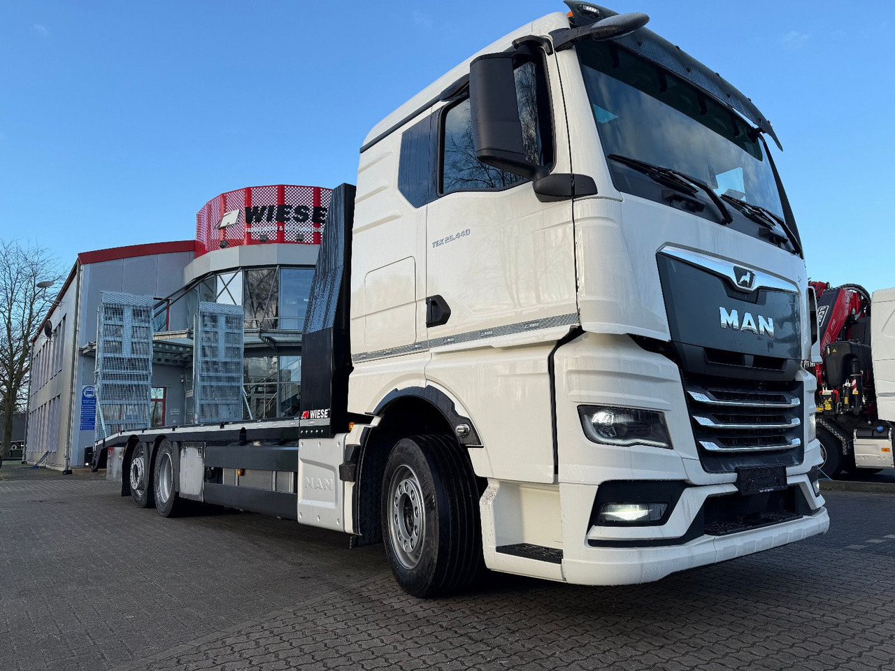 MAN Baumaschinen- Arbeitsbühnentransporter Rampen - Auto evakuators: foto 2 MAN Baumaschinen- Arbeitsbühnentransporter Rampen - Auto evakuators: foto 2