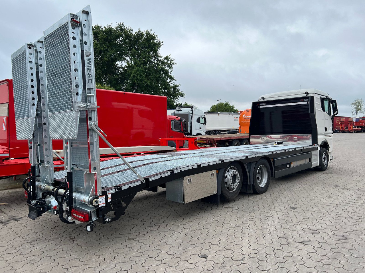 MAN Baumaschinen- Arbeitsbühnentransporter Rampen - Auto evakuators: foto 5 MAN Baumaschinen- Arbeitsbühnentransporter Rampen - Auto evakuators: foto 5