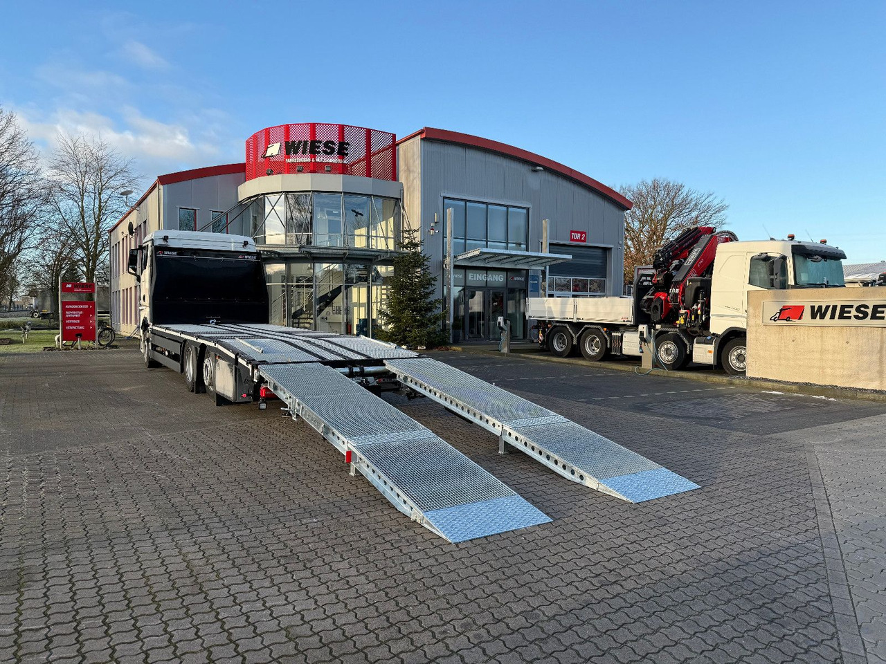 MAN Baumaschinen- Arbeitsbühnentransporter Rampen - Autovedējs: foto 1 MAN Baumaschinen- Arbeitsbühnentransporter Rampen - Autovedējs: foto 1