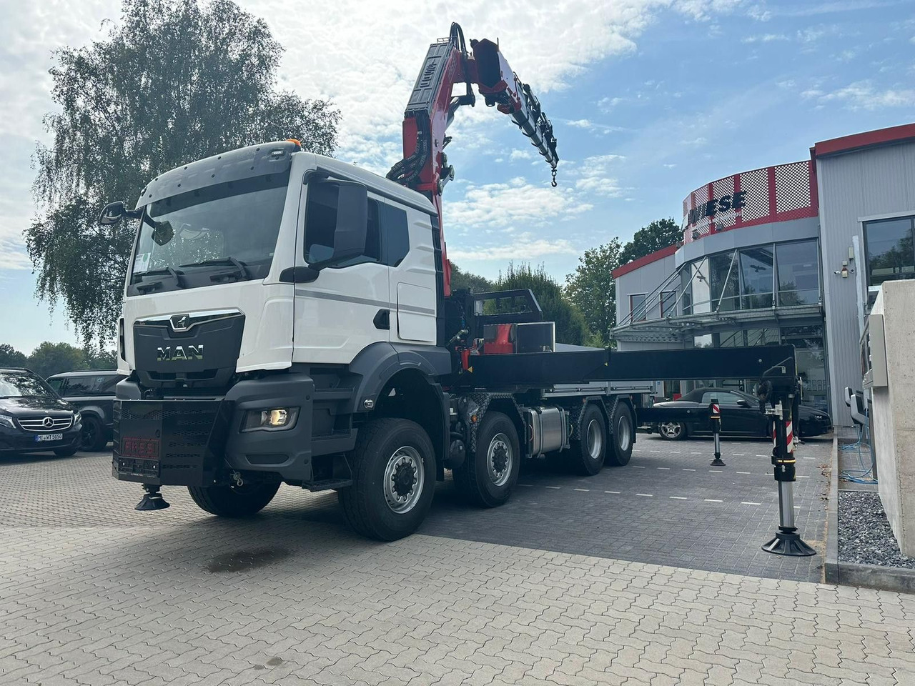 MAN TGS 41.520 8x8 mit Fassi Ladekran F710RA.2.26 - Bortu kravas automašīna/ Platforma: foto 2 MAN TGS 41.520 8x8 mit Fassi Ladekran F710RA.2.26 - Bortu kravas automašīna/ Platforma: foto 2