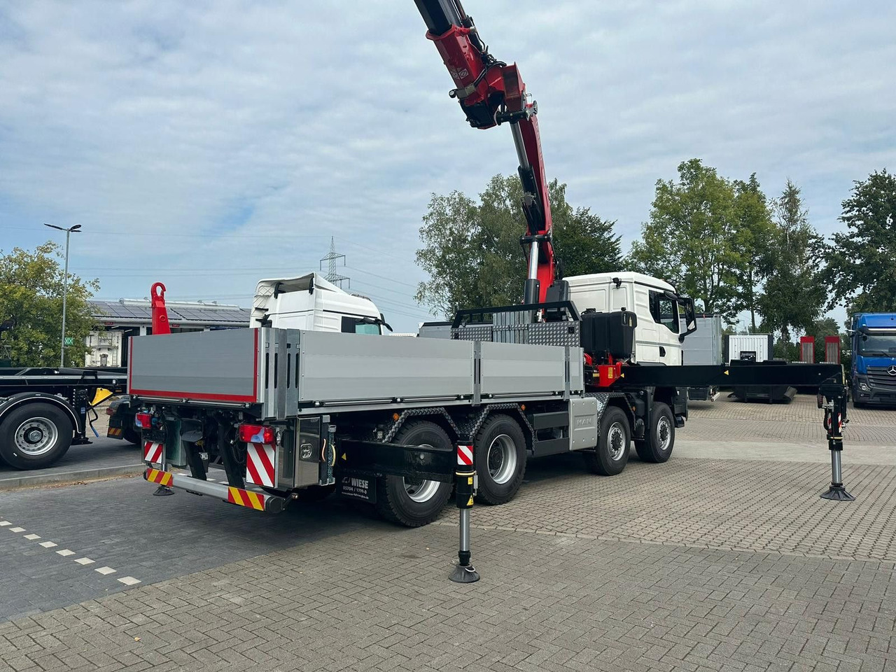 MAN TGS 41.520 8x8 mit Fassi Ladekran F710RA.2.26 - Kravas auto ar manipulatoru: foto 3 MAN TGS 41.520 8x8 mit Fassi Ladekran F710RA.2.26 - Kravas auto ar manipulatoru: foto 3