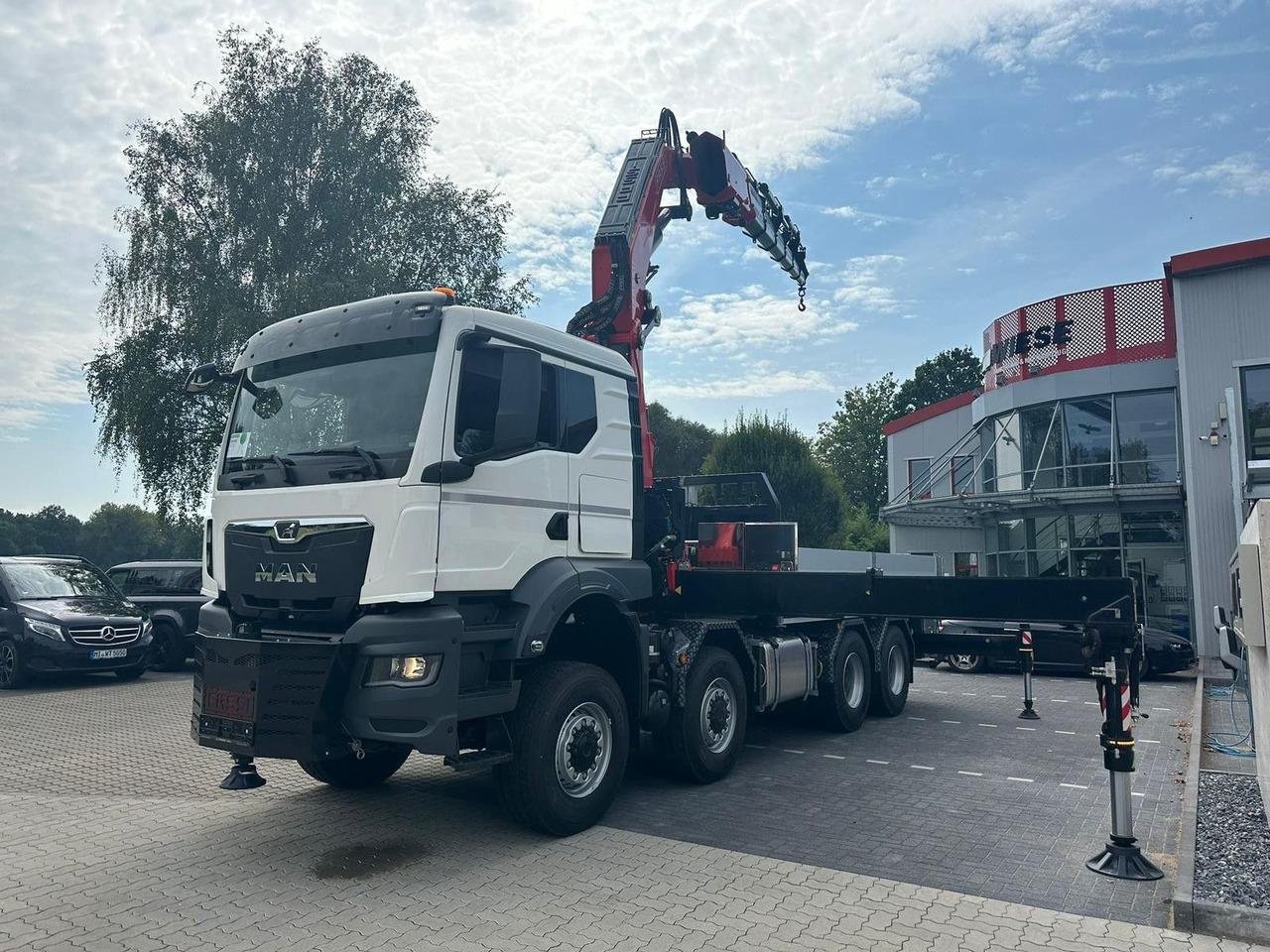MAN TGS 41.520 8x8 mit Fassi Ladekran F710RA.2.26 - Kravas auto ar manipulatoru: foto 2 MAN TGS 41.520 8x8 mit Fassi Ladekran F710RA.2.26 - Kravas auto ar manipulatoru: foto 2