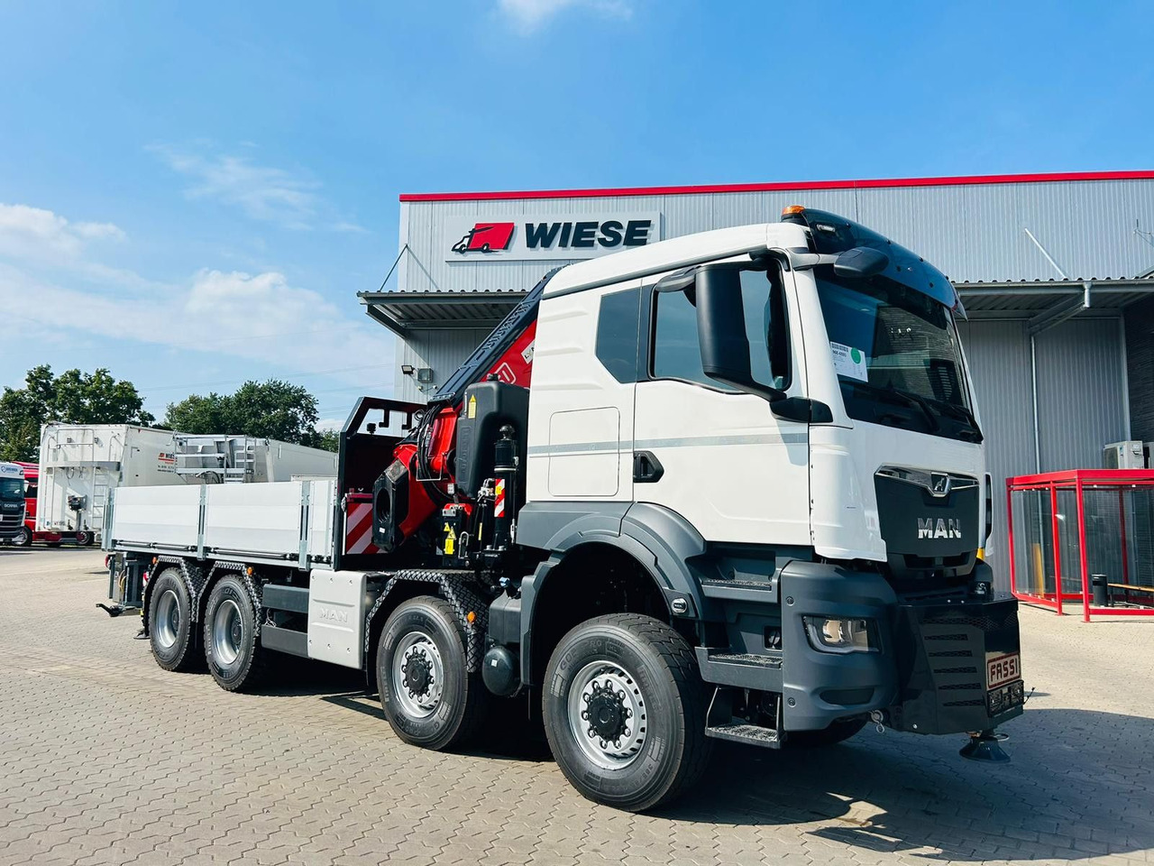 MAN TGS 41.520 8x8 mit Fassi Ladekran F710RA.2.26 - Bortu kravas automašīna/ Platforma: foto 4 MAN TGS 41.520 8x8 mit Fassi Ladekran F710RA.2.26 - Bortu kravas automašīna/ Platforma: foto 4