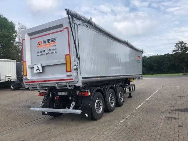Schmitz Cargobull Kipper 52m³ mit gekröpftem Chassis - Puspiekabe pašizgāzējs: foto 3 Schmitz Cargobull Kipper 52m³ mit gekröpftem Chassis - Puspiekabe pašizgāzējs: foto 3