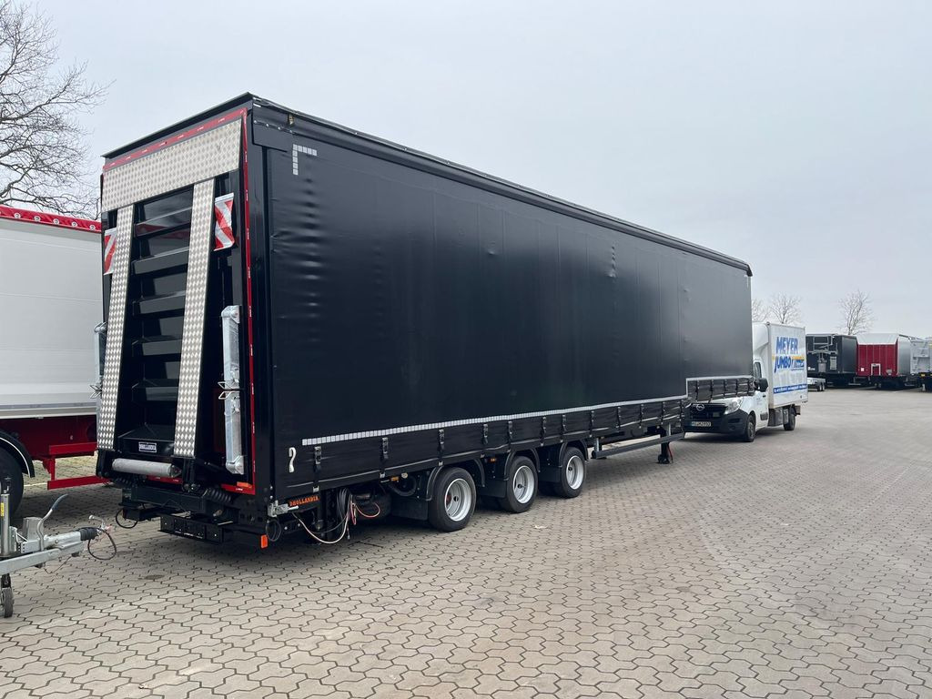 Wiese Gabelstaplertransporter Mega mit Rampen - Puspiekabe zema profila platforma: foto 1 Wiese Gabelstaplertransporter Mega mit Rampen - Puspiekabe zema profila platforma: foto 1