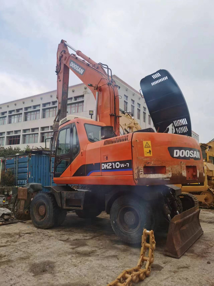 DOOSAN DH210W-7 - Riteņu ekskavators: foto 1 DOOSAN DH210W-7 - Riteņu ekskavators: foto 1