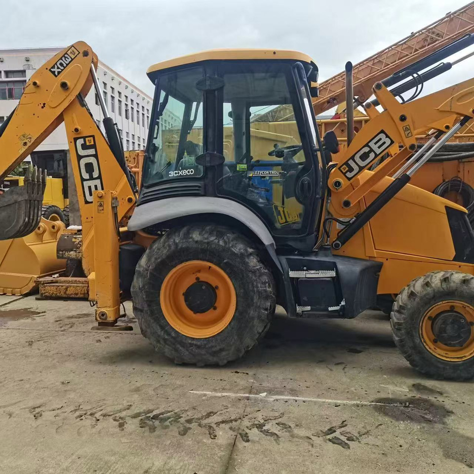 JCB 3CX - Ekskavators-iekrāvējs: foto 4 JCB 3CX - Ekskavators-iekrāvējs: foto 4