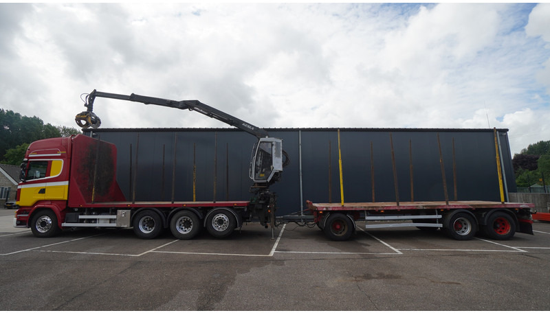 Scania R 580 V8 8X4 LOGTRANSPORT COMBI WITH MTDK YEAR 2012 TRAILER KESLA 46 CRANE - Kokvedējs, Kravas auto ar manipulatoru: foto 1 Scania R 580 V8 8X4 LOGTRANSPORT COMBI WITH MTDK YEAR 2012 TRAILER KESLA 46 CRANE - Kokvedējs, Kravas auto ar manipulatoru: foto 1