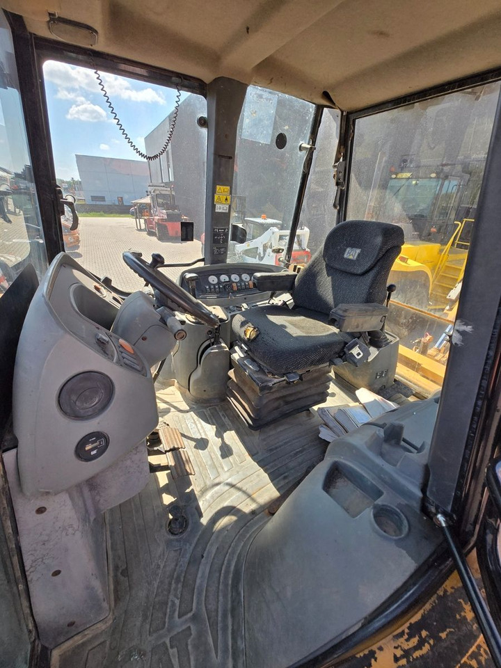 Ekskavators-iekrāvējs CAT 428D: foto 14