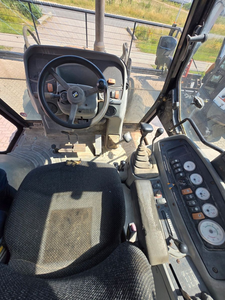 Ekskavators-iekrāvējs CAT 428D: foto 18