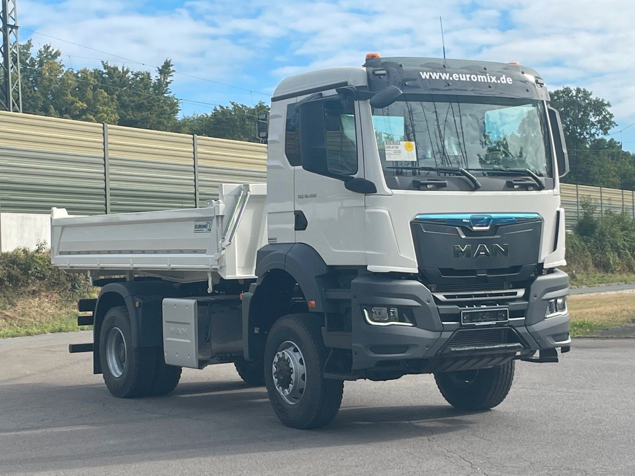 MAN TGS 18.400 TG3 4x4 Euro6e 3-Seiten-Kippe Euromix - Kravas automašīna pašizgāzējs: foto 3 MAN TGS 18.400 TG3 4x4 Euro6e 3-Seiten-Kippe Euromix - Kravas automašīna pašizgāzējs: foto 3