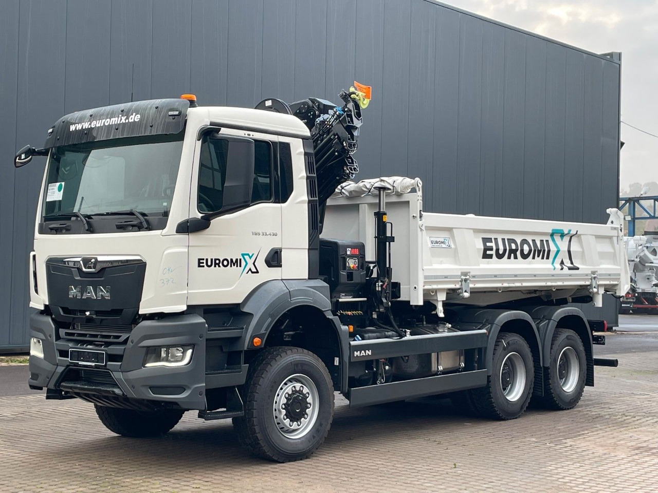 MAN TGS 33.440 6x6 /3-Seiten- Kipper / HIAB 228-6 - Kravas automašīna pašizgāzējs, Kravas auto ar manipulatoru: foto 3 MAN TGS 33.440 6x6 /3-Seiten- Kipper / HIAB 228-6 - Kravas automašīna pašizgāzējs, Kravas auto ar manipulatoru: foto 3