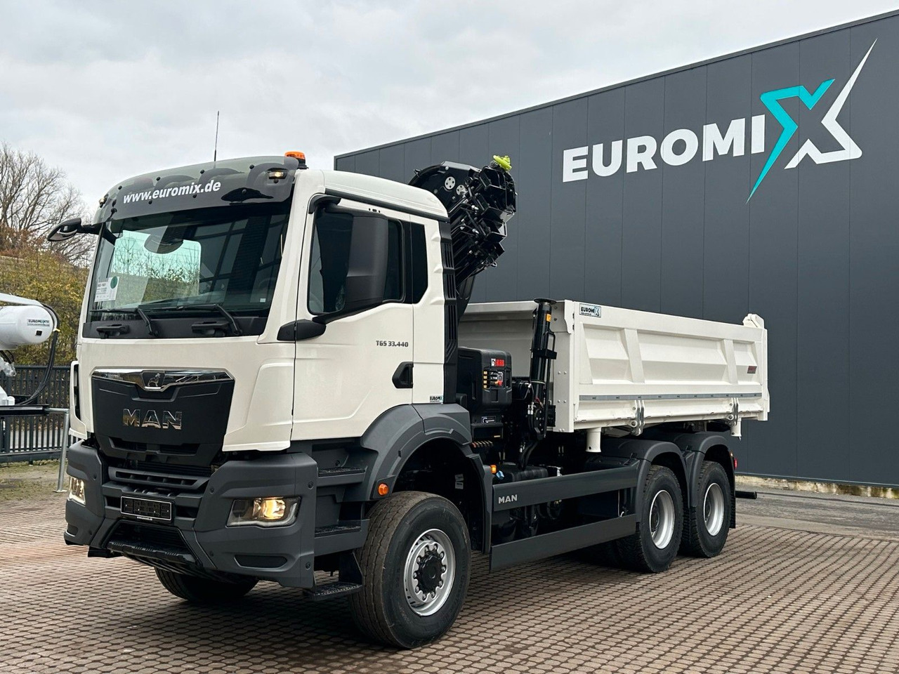 MAN TGS 33.440 6x6 /3-Seiten- Kipper / Kran HIAB 302 - Kravas automašīna pašizgāzējs, Kravas auto ar manipulatoru: foto 2 MAN TGS 33.440 6x6 /3-Seiten- Kipper / Kran HIAB 302 - Kravas automašīna pašizgāzējs, Kravas auto ar manipulatoru: foto 2