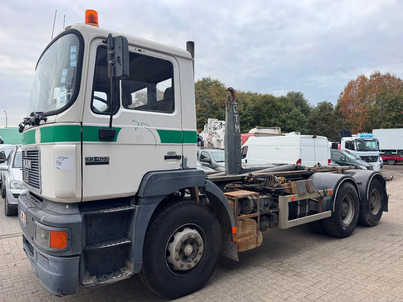 MAN 33.403 **BELGIAN TRUCK-FULL STEEL-MANUAL PUMP** - Pacēlājs ar āķi: foto 1 MAN 33.403 **BELGIAN TRUCK-FULL STEEL-MANUAL PUMP** - Pacēlājs ar āķi: foto 1