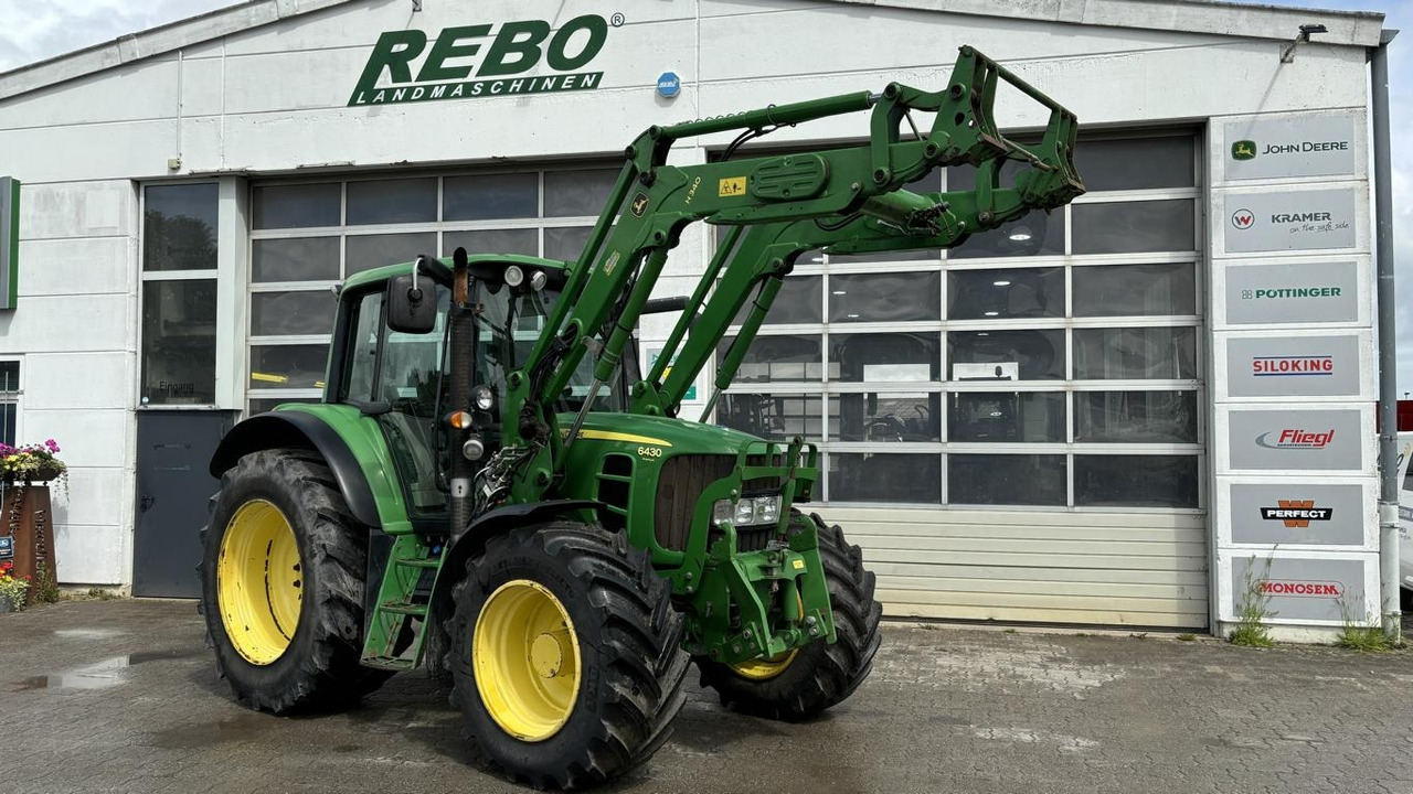 John Deere 6430 - Traktors: foto 1 John Deere 6430 - Traktors: foto 1