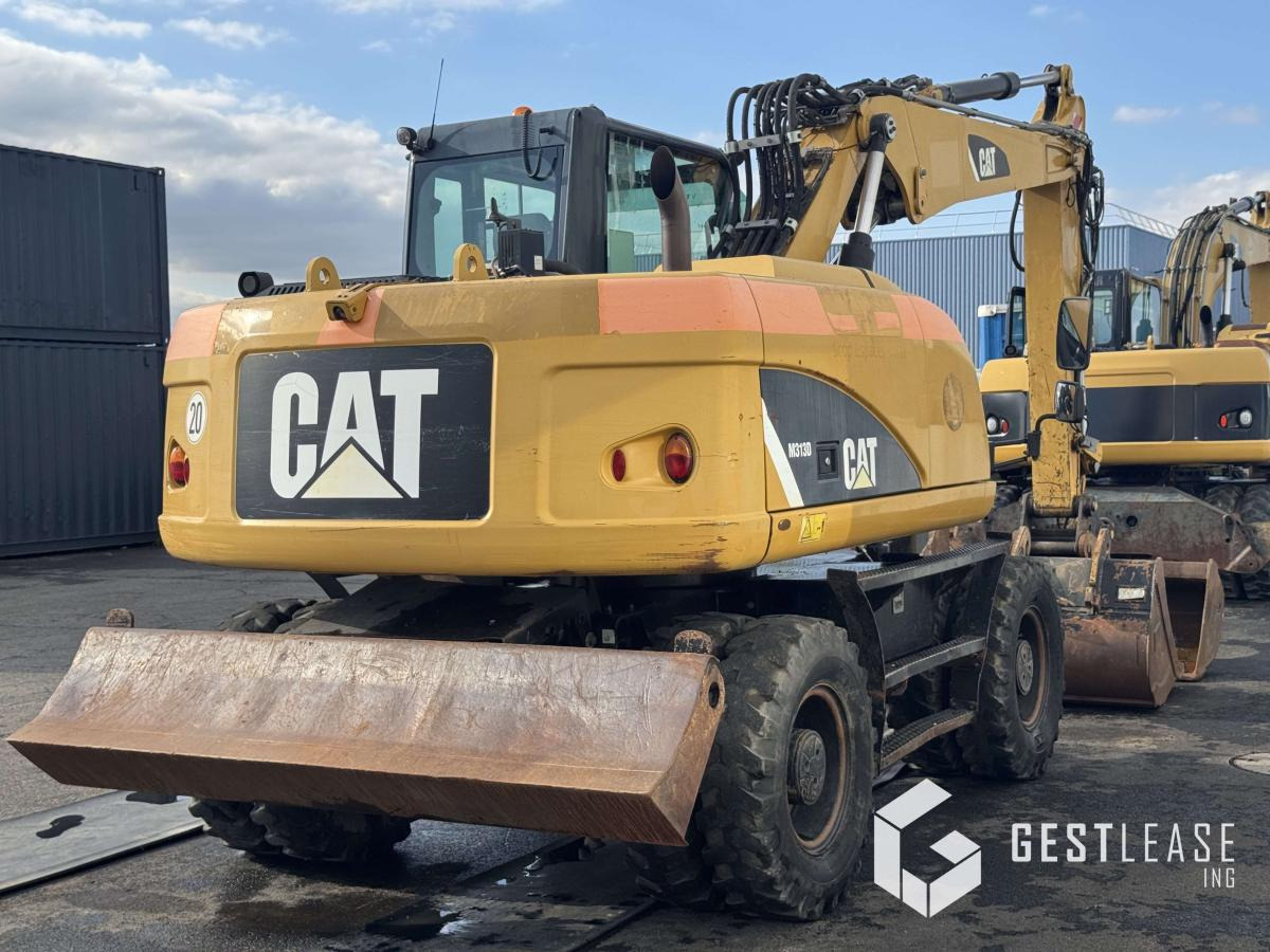 Caterpillar M313D - Riteņu ekskavators: foto 3 Caterpillar M313D - Riteņu ekskavators: foto 3