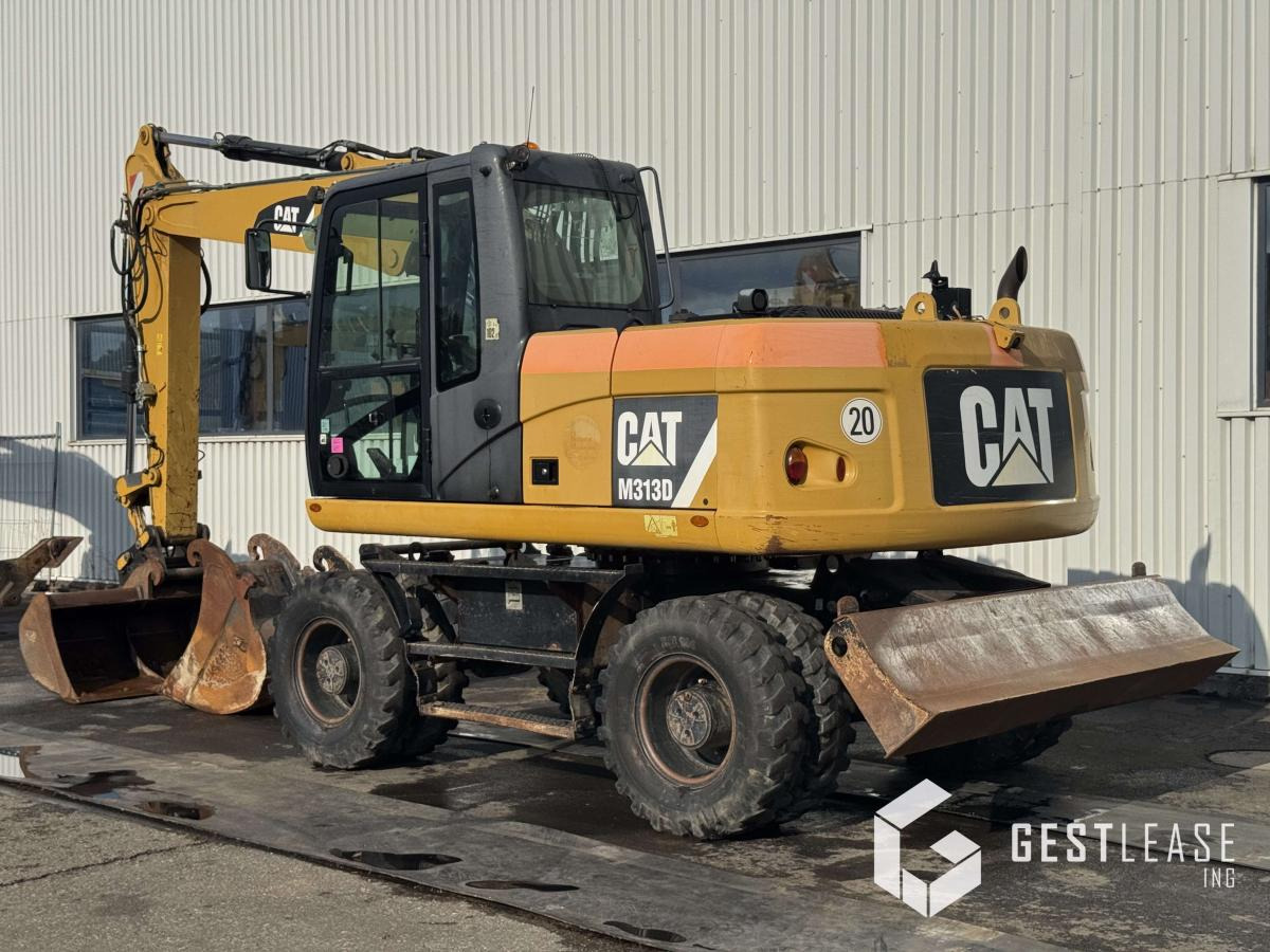 Caterpillar M313D - Riteņu ekskavators: foto 2 Caterpillar M313D - Riteņu ekskavators: foto 2