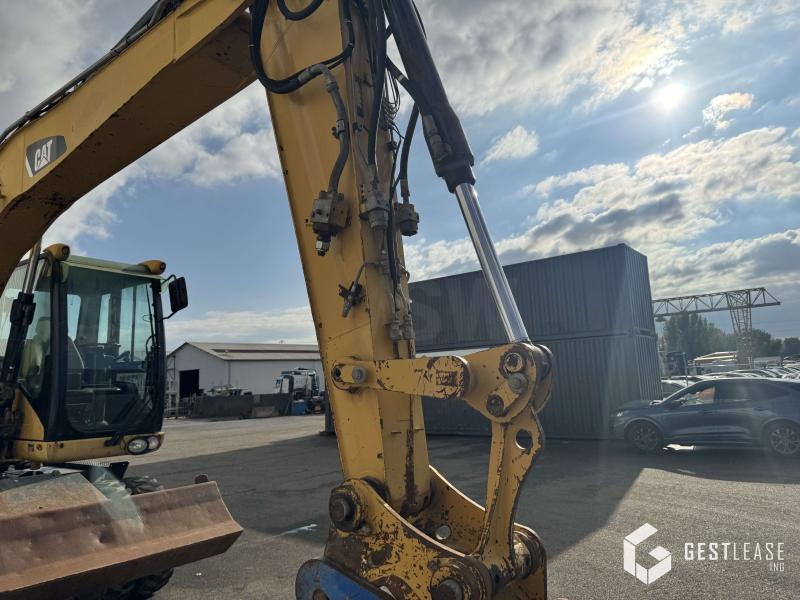 Caterpillar M313D - Riteņu ekskavators: foto 5 Caterpillar M313D - Riteņu ekskavators: foto 5