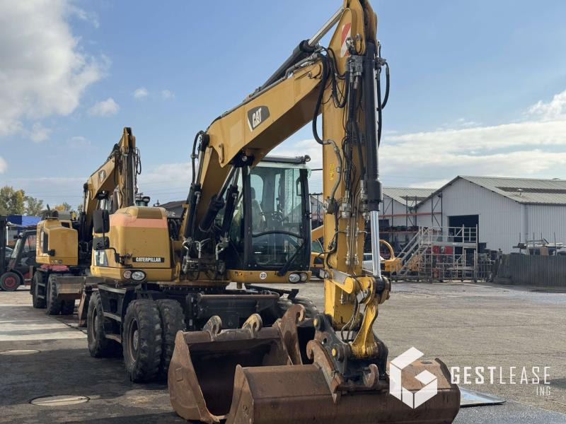 Caterpillar M313D - Riteņu ekskavators: foto 4 Caterpillar M313D - Riteņu ekskavators: foto 4