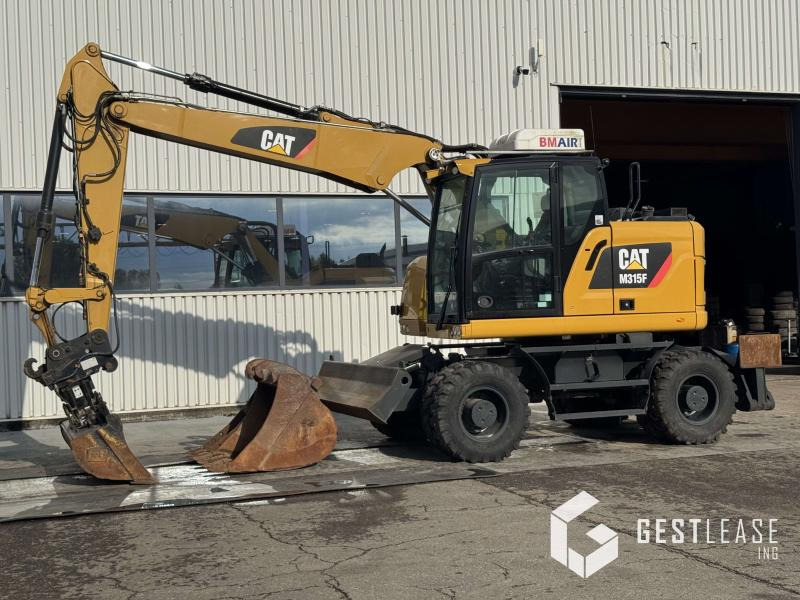 Caterpillar M315F - Riteņu ekskavators: foto 1 Caterpillar M315F - Riteņu ekskavators: foto 1