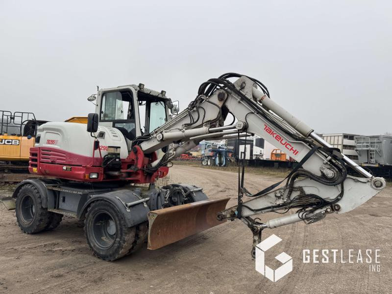 Takeuchi TB295W - Riteņu ekskavators: foto 4 Takeuchi TB295W - Riteņu ekskavators: foto 4
