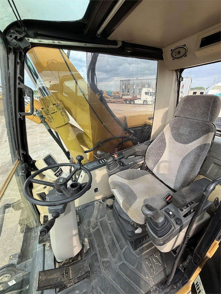 Riteņu ekskavators CAT M315C: foto 11