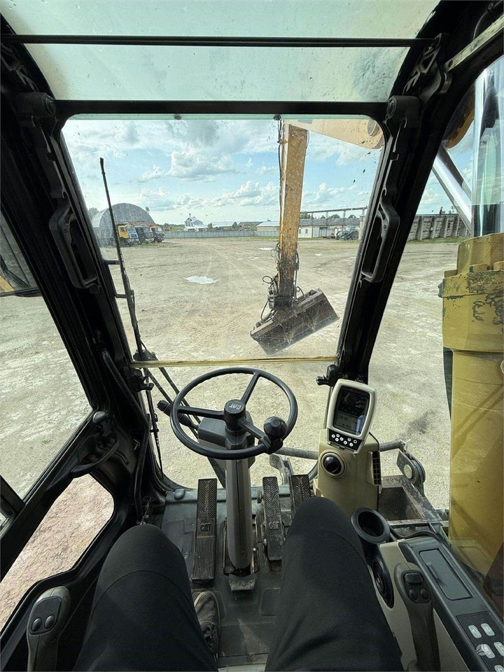Riteņu ekskavators CAT M315C: foto 12