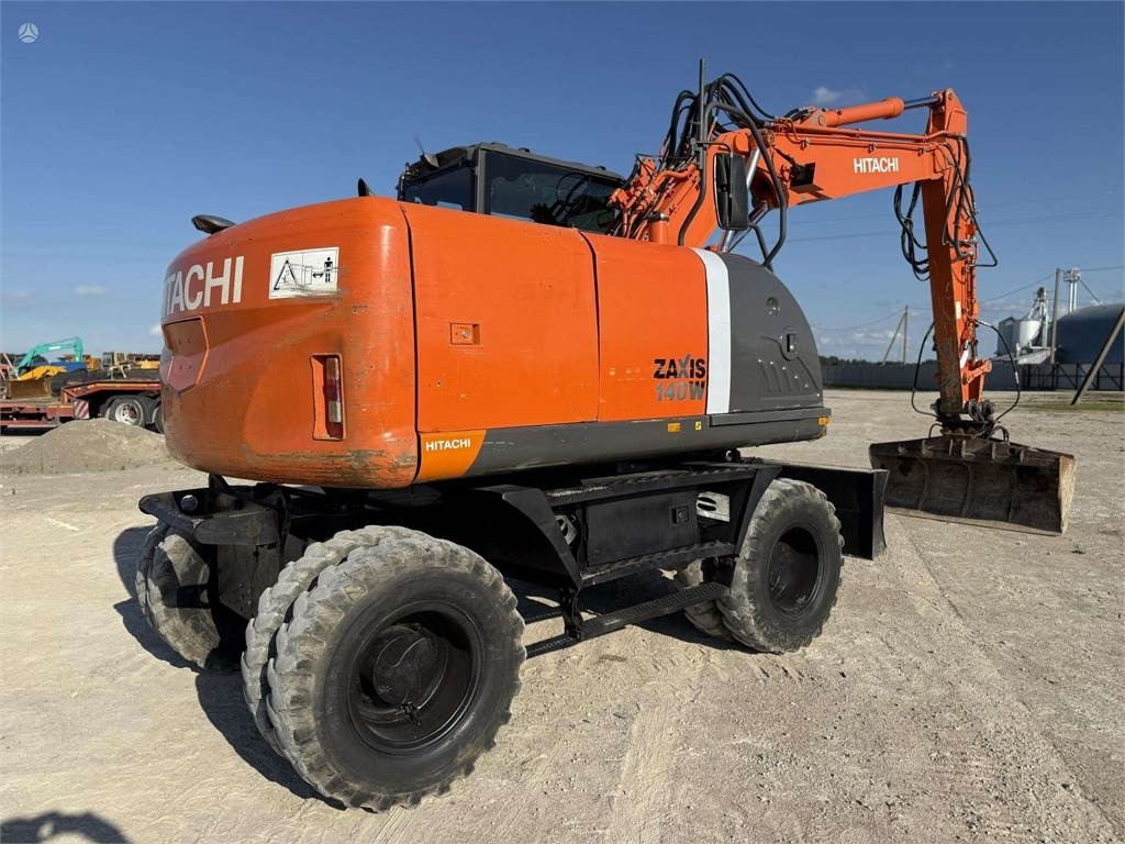 Hitachi ZX 140 W - Riteņu ekskavators: foto 4 Hitachi ZX 140 W - Riteņu ekskavators: foto 4