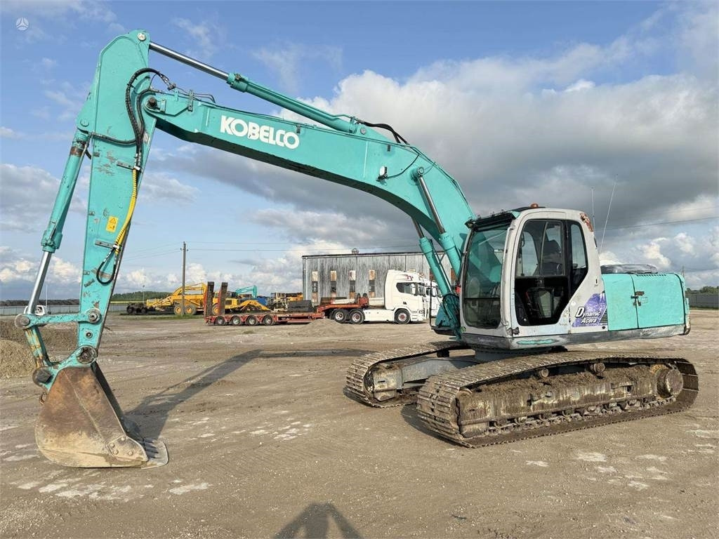 Kobelco SK 210'LC-6 - Kāpurķēžu ekskavators: foto 1 Kobelco SK 210'LC-6 - Kāpurķēžu ekskavators: foto 1