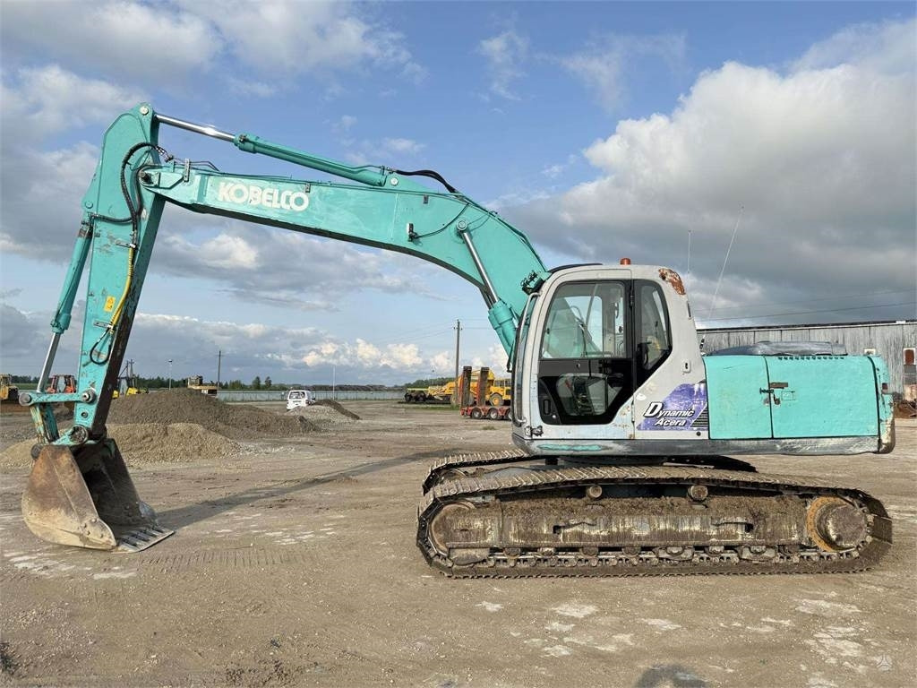 Kobelco SK 210'LC-6 - Kāpurķēžu ekskavators: foto 2 Kobelco SK 210'LC-6 - Kāpurķēžu ekskavators: foto 2