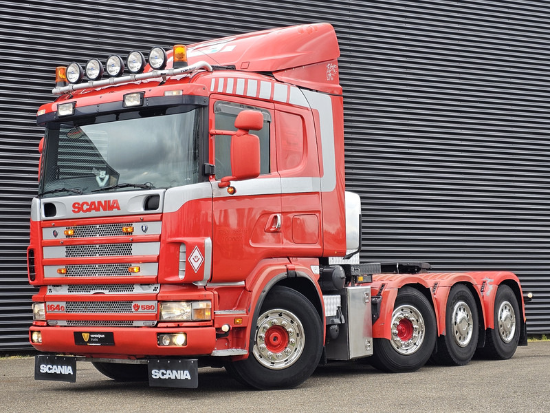 Scania R 164.580 8x4-4 / MANUAL / RETARDER / BIG AXLE / 150T - Vilcējs: foto 1 Scania R 164.580 8x4-4 / MANUAL / RETARDER / BIG AXLE / 150T - Vilcējs: foto 1