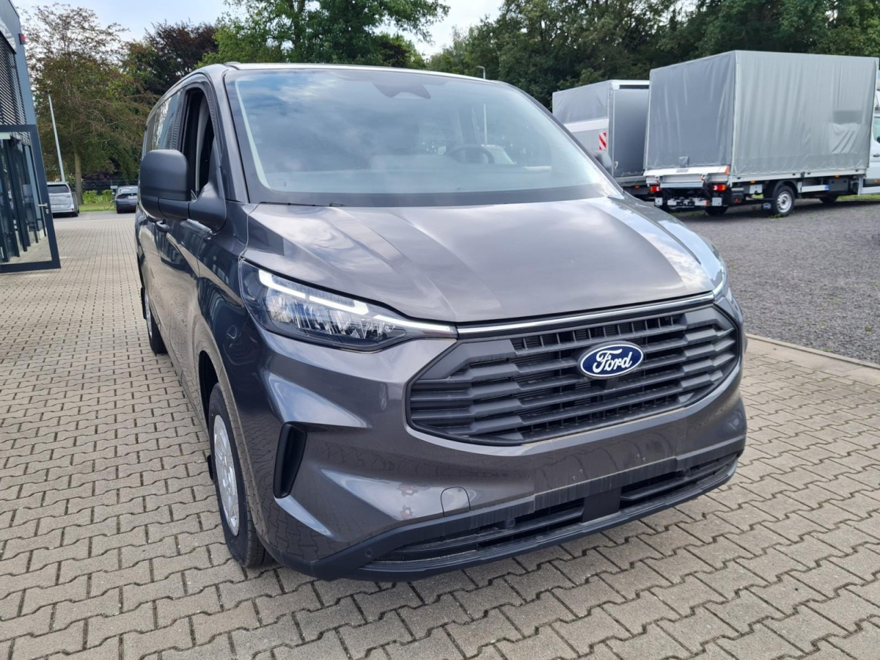 Ford Custom Kasten 320 L2 Trend Doka 5-Sitze KAMERA TEMPO - Mazs furgons, Kravas-pasažieru furgons: foto 2 Ford Custom Kasten 320 L2 Trend Doka 5-Sitze KAMERA TEMPO - Mazs furgons, Kravas-pasažieru furgons: foto 2