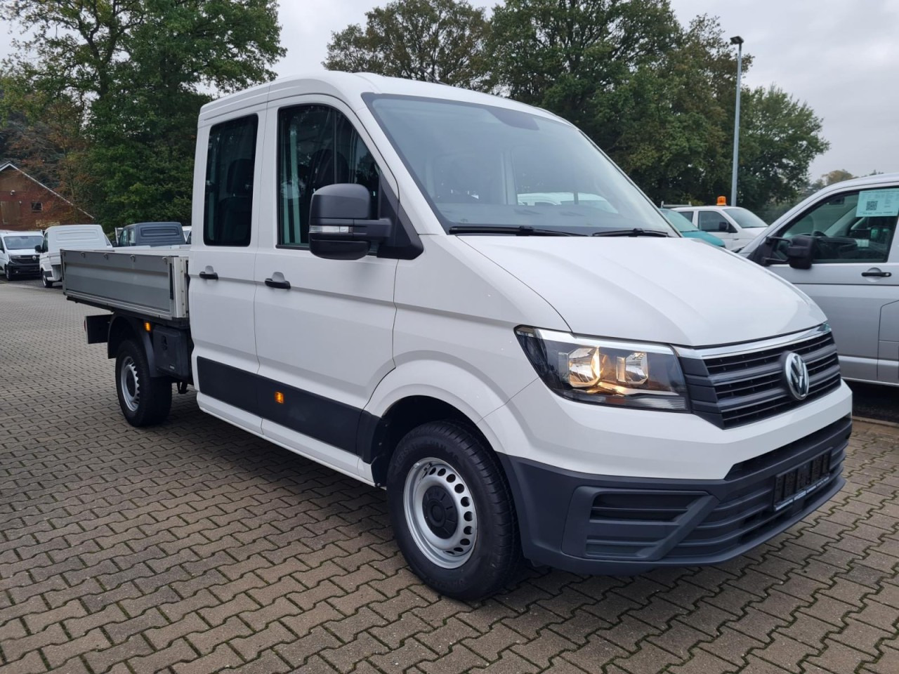 Volkswagen Crafter 35 Doka MR Pritsche AHK Klima 7 Sitzer - Automašīna ar kravas platformu, Kravas-pasažieru furgons: foto 3 Volkswagen Crafter 35 Doka MR Pritsche AHK Klima 7 Sitzer - Automašīna ar kravas platformu, Kravas-pasažieru furgons: foto 3