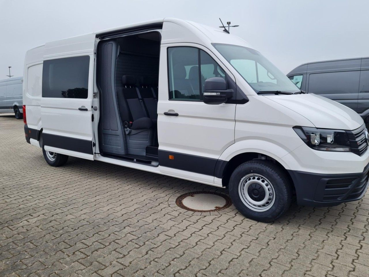 Volkswagen Crafter 35 Kasten Plus 4MOTION Doka Mixto L4H3 - Kravas mikroautobuss, Kravas-pasažieru furgons: foto 4 Volkswagen Crafter 35 Kasten Plus 4MOTION Doka Mixto L4H3 - Kravas mikroautobuss, Kravas-pasažieru furgons: foto 4